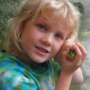 child with frog image
